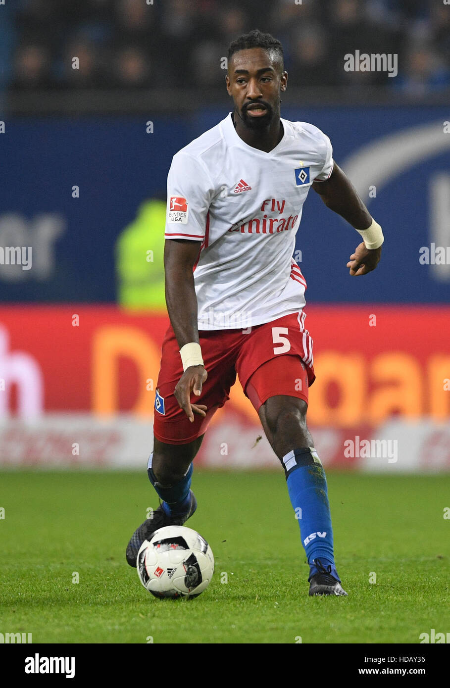 Hamburg's Johan Djourou passeds a ball during the German Bundesliga football match between Hamburg SV and FC Augsburg at the Volksparkstadion in Hamburg, Germany, 10 December 2016. The game ended 1:0 win to Hamburg.       (EMBARGO CONDITIONS - ATTENTION: Due to the accreditation guidelines, the DFL only permits the publication and utilisation of up to 15 pictures per match on the internet and in online media during the match.) Photo: Axel Heimken/dpa Stock Photo