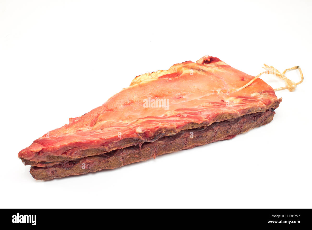 Smoked pork bone with meat isolated on white Stock Photo