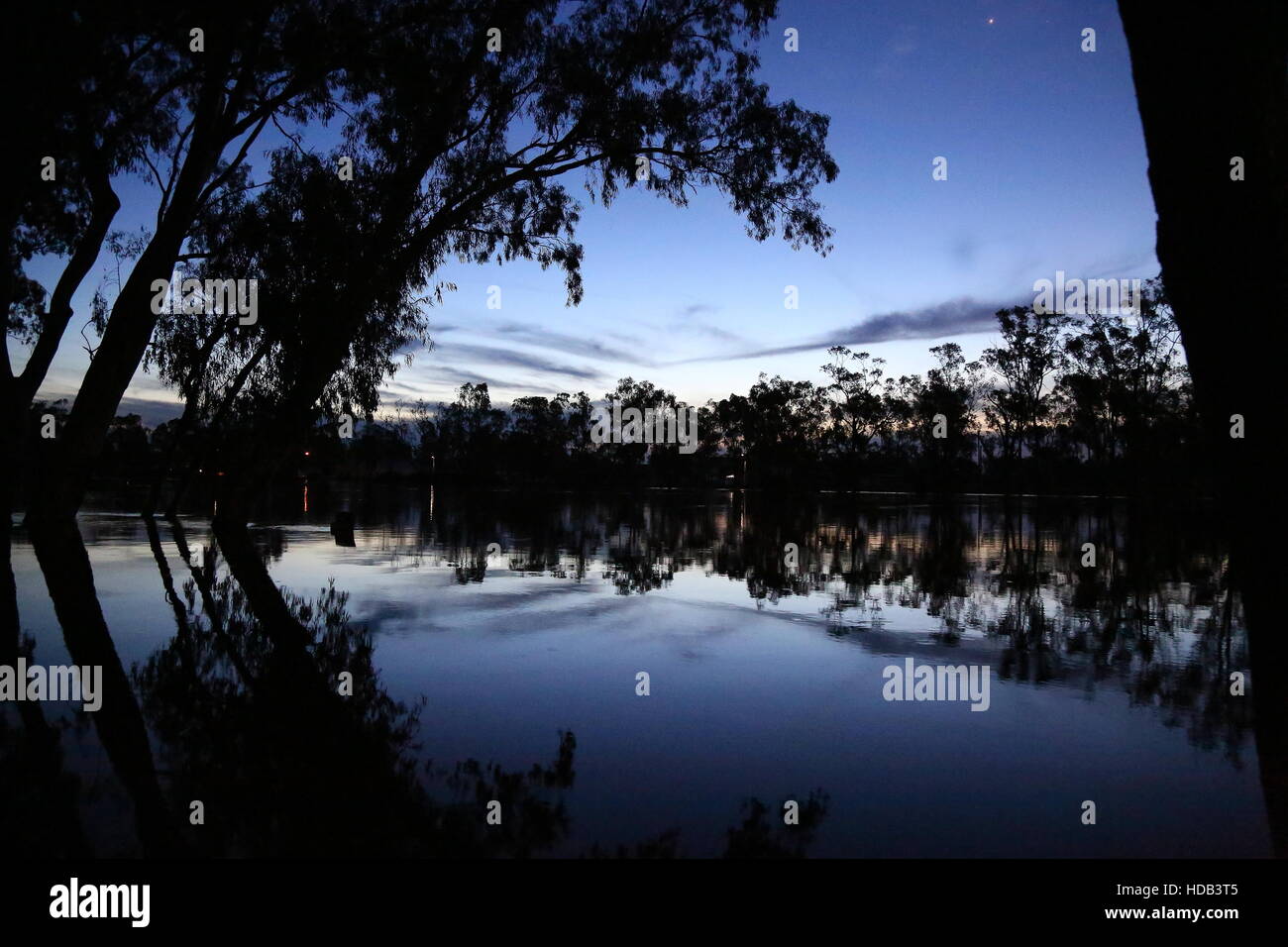Murray River In Flood Sun set Barham New South Whales Australia Stock Photo