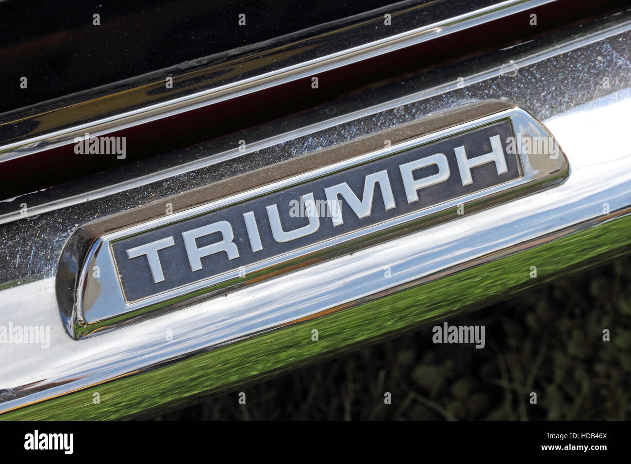 Triumph logo on rear bumper of Triumph Stag sports car Stock Photo