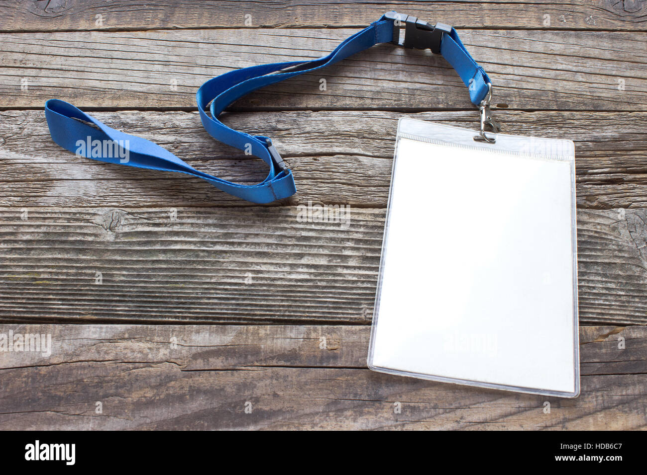 Blank ID card tag on wooden background Stock Photo Alamy