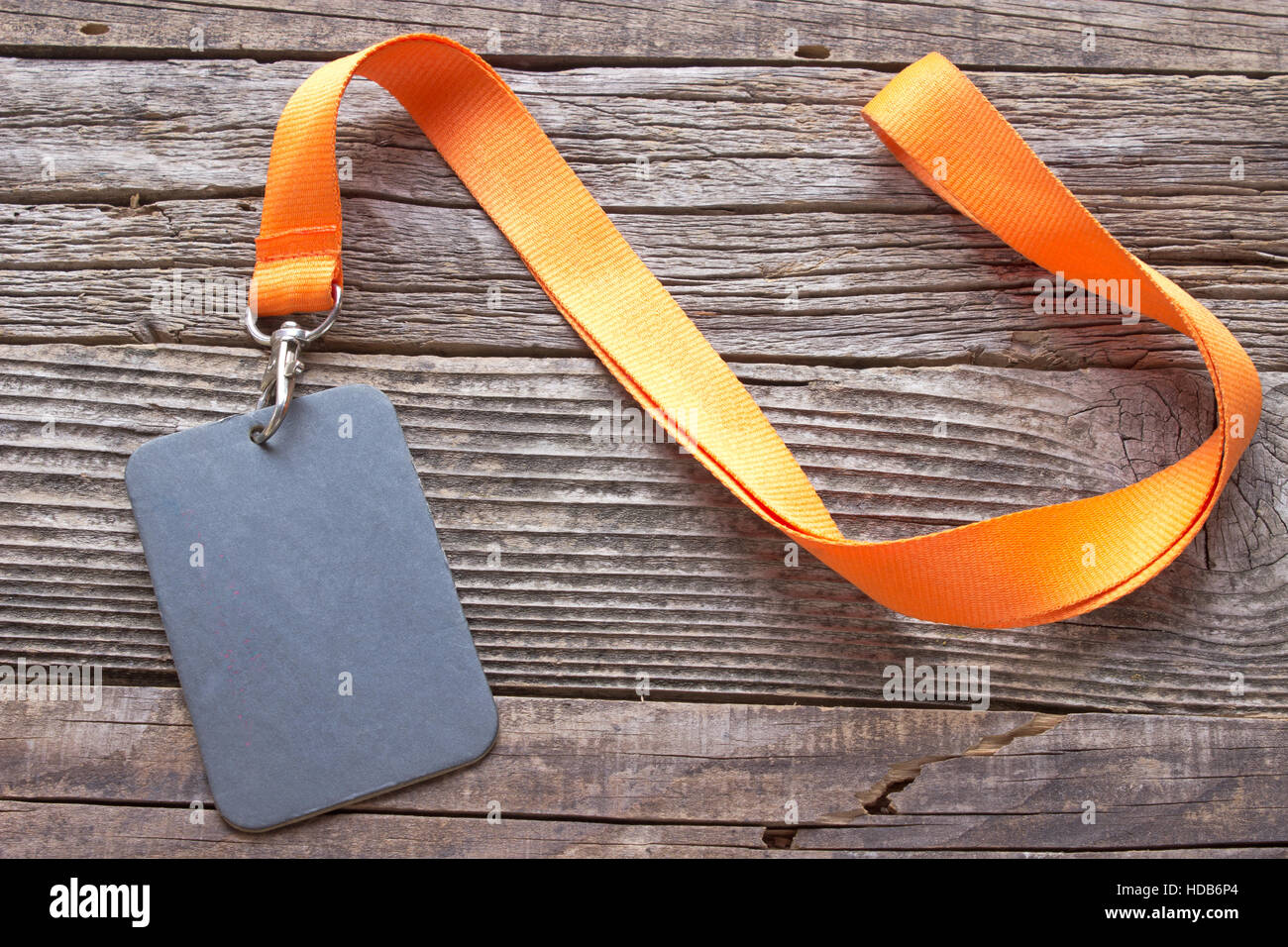 Blank ID card tag on wooden background Stock Photo Alamy