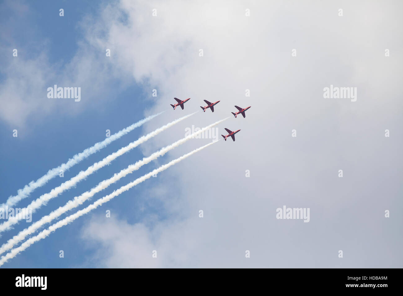 Planes on an air show against cloudy sky Stock Photo - Alamy