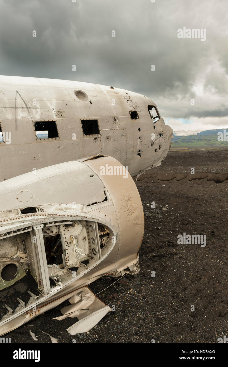 Iceland - Solheimasandur United States Navy DC-3 aeroplane wreck side view of a section of the wing and cockpit. Stock Photo