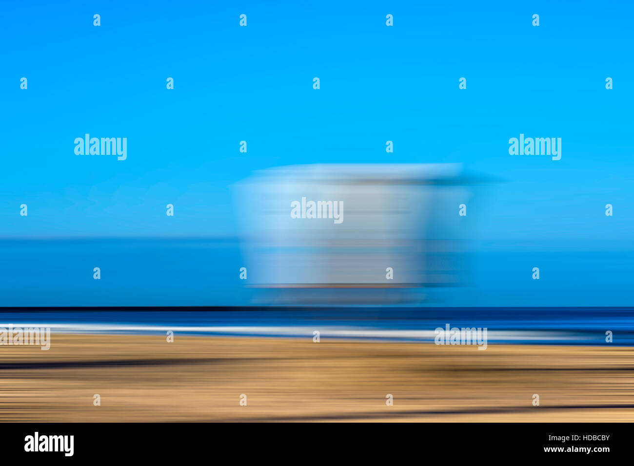 lifeguard tower, coastal scene, motion blur effect. Stock Photo