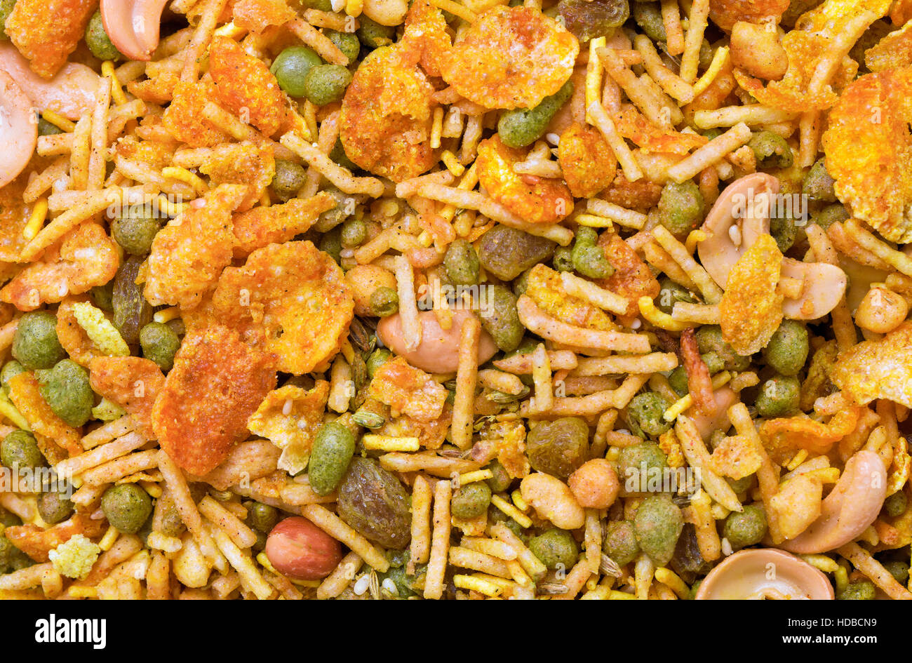 Dry roasted Indian snack mix, close-up background Stock Photo - Alamy