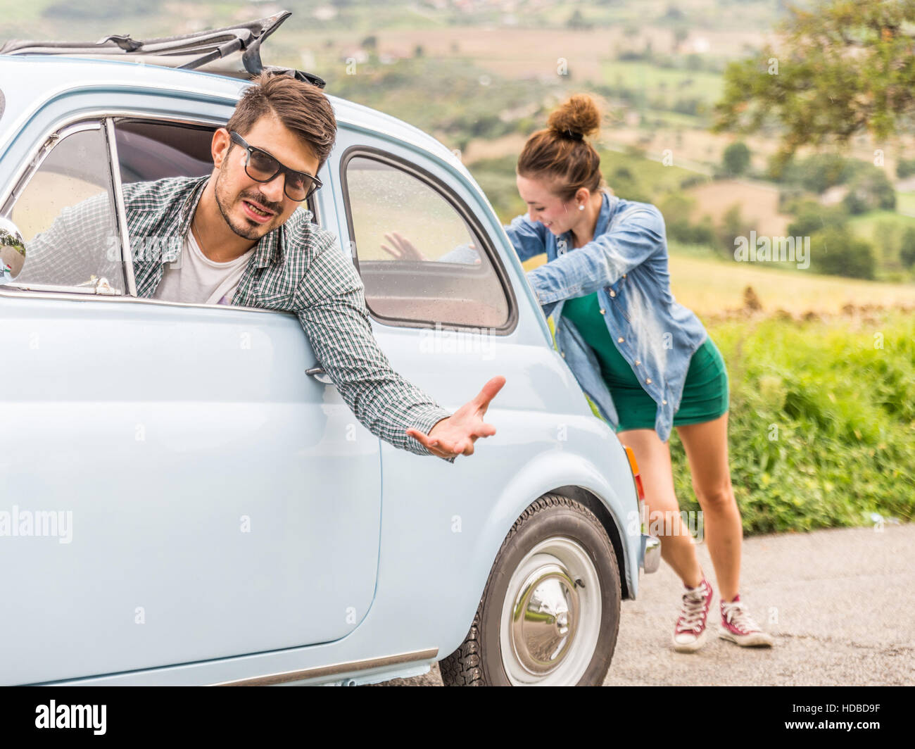 girl push car