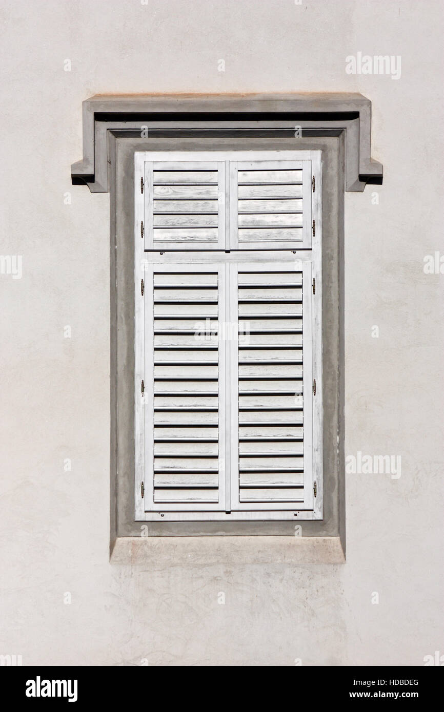 Closed green wooden window shutters, security element Stock Photo - Alamy