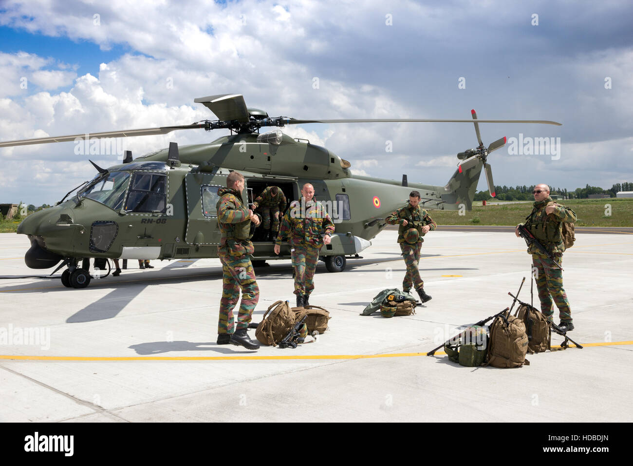 Belgian soldiers preparing before boarding an NH90 helicopter Stock Photo