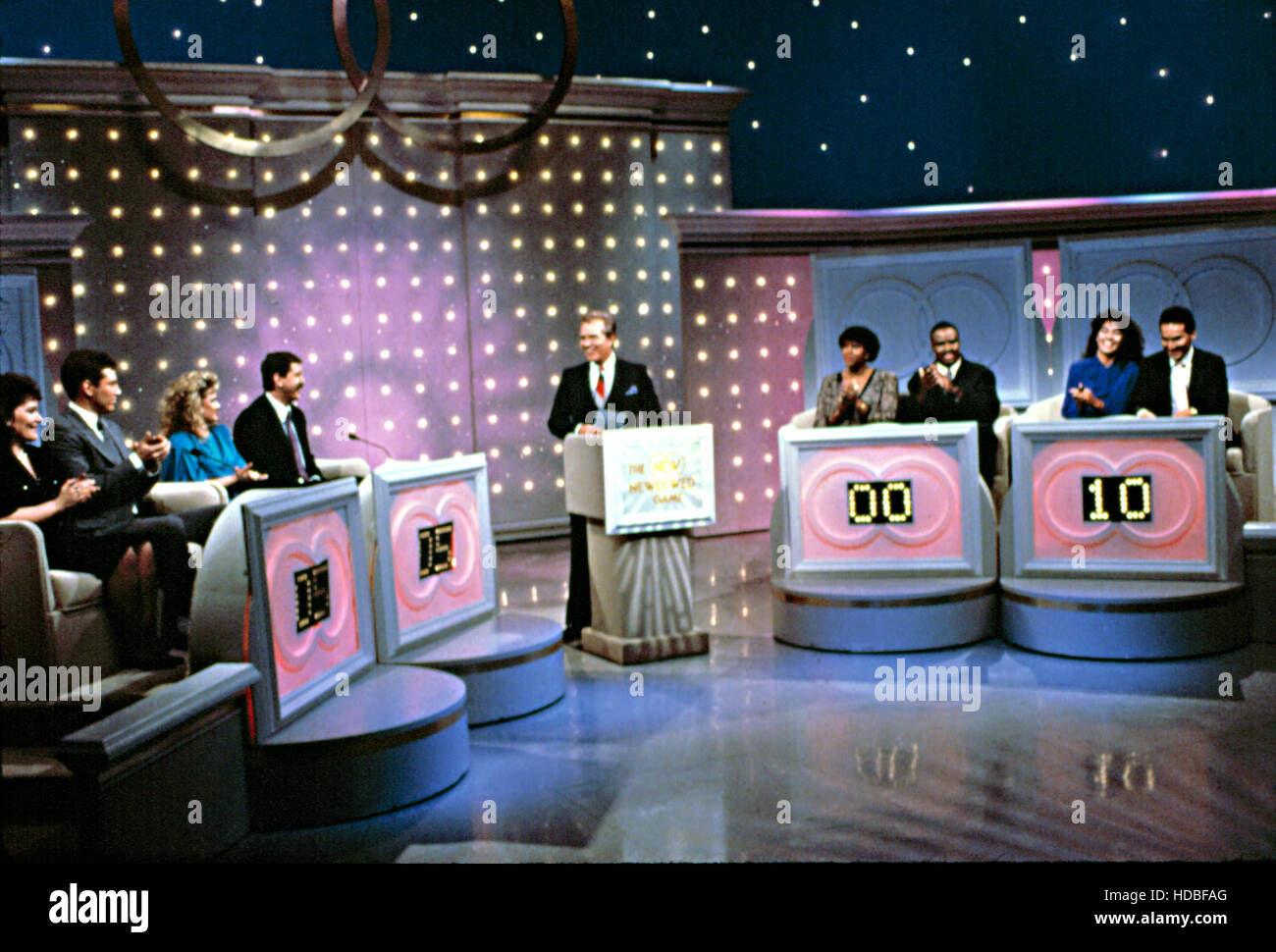 THE NEWLYWED GAME, host, Bob Eubanks, & the newlywed contestants, 1984