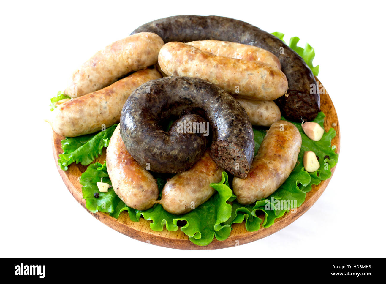 Homemade liver sausage meat and raw sausage on a wooden board Stock Photo