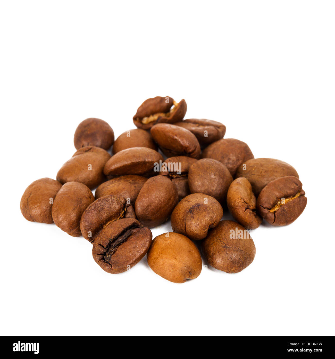 Pile of roasted coffee beans isolated in white background Stock Photo ...