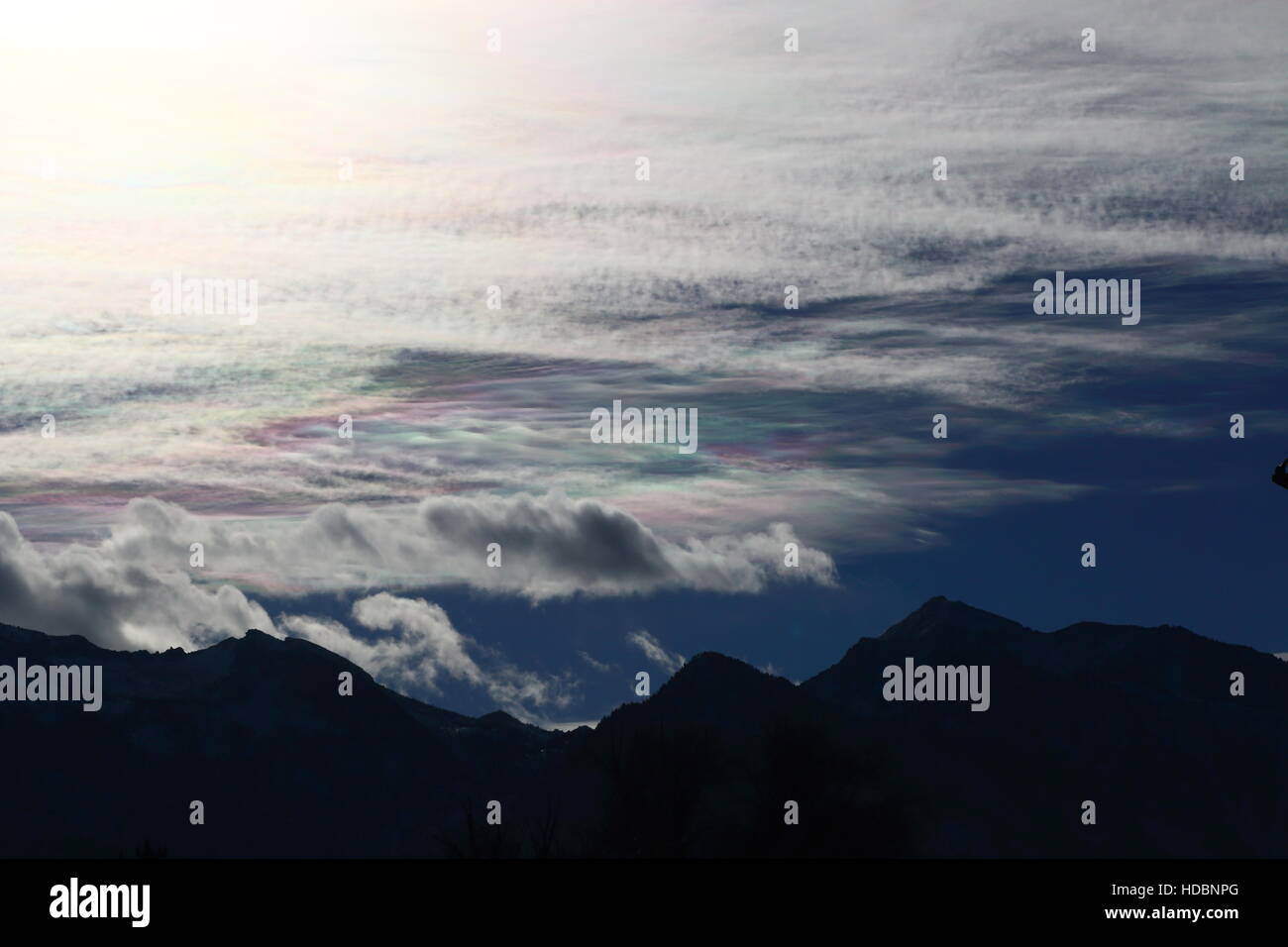 beautiful iridescence rainbow clouds over Utah Stock Photo