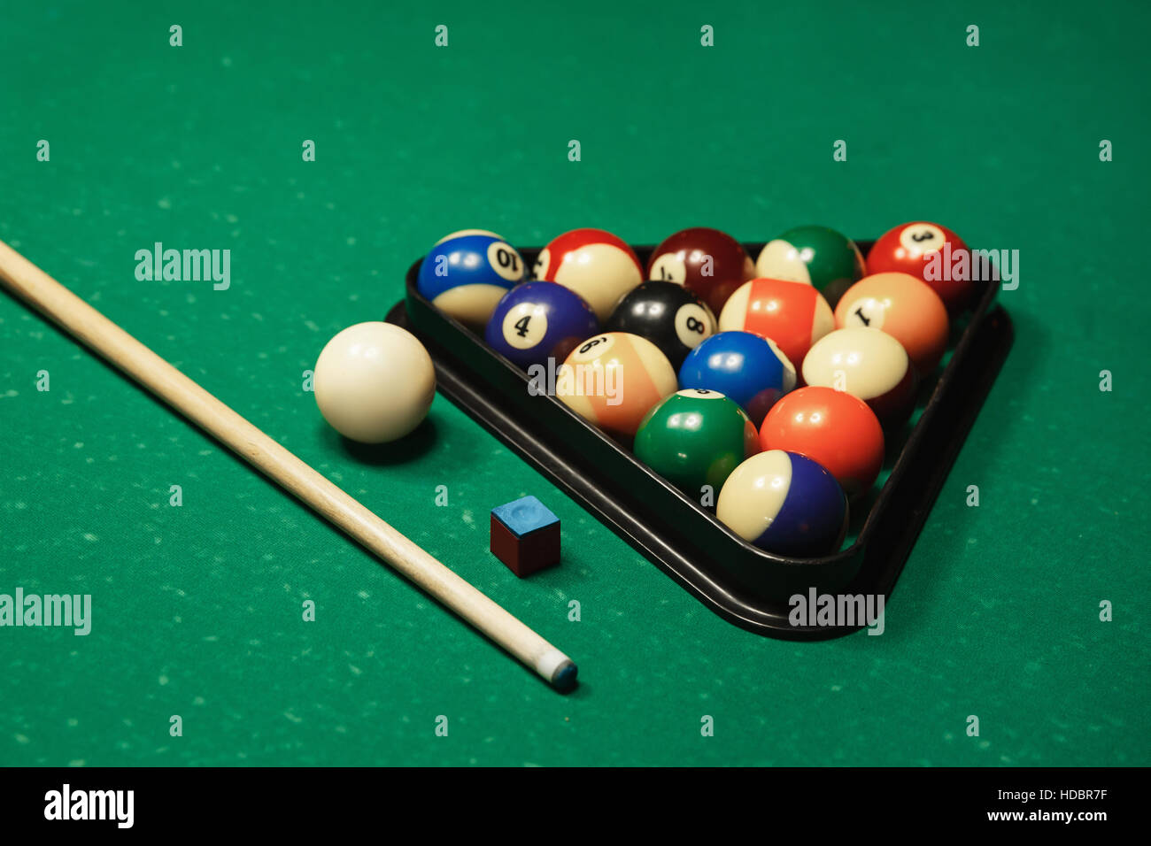 Billiard balls near by cue and chalk Stock Photo Alamy