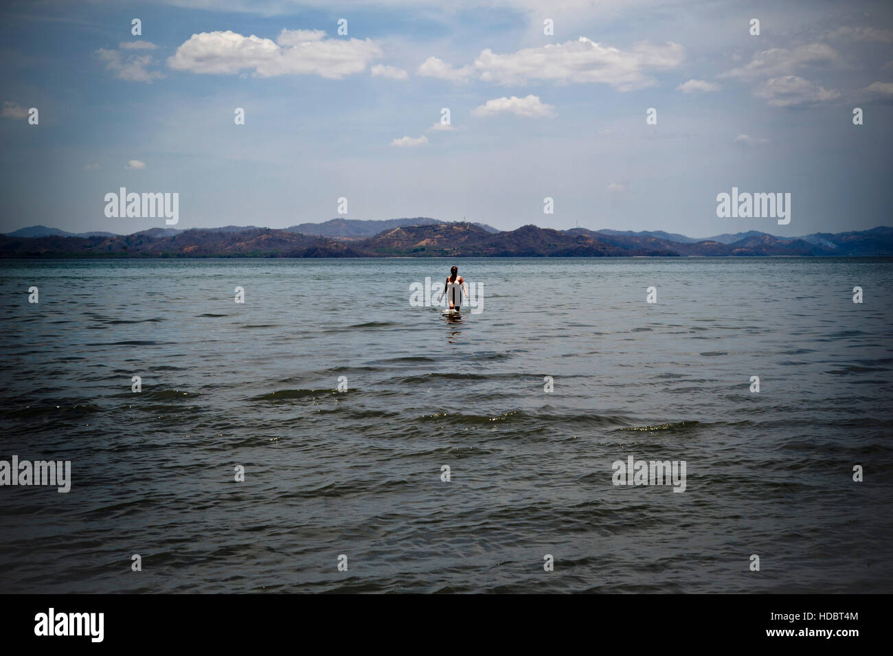 Woman running on tropical hi-res stock photography and images - Alamy