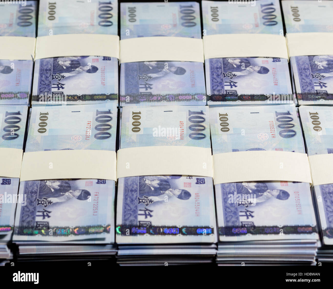 Stacks of New Taiwan Dollar bills Stock Photo