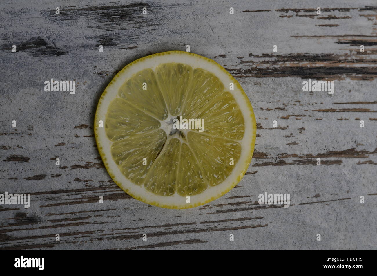 lemons cut open on a cutting board Stock Photo Alamy