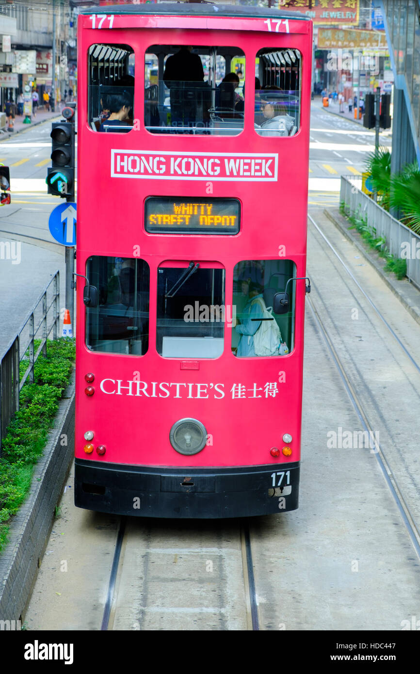 Trams on the street in Hong Kong Stock Photo