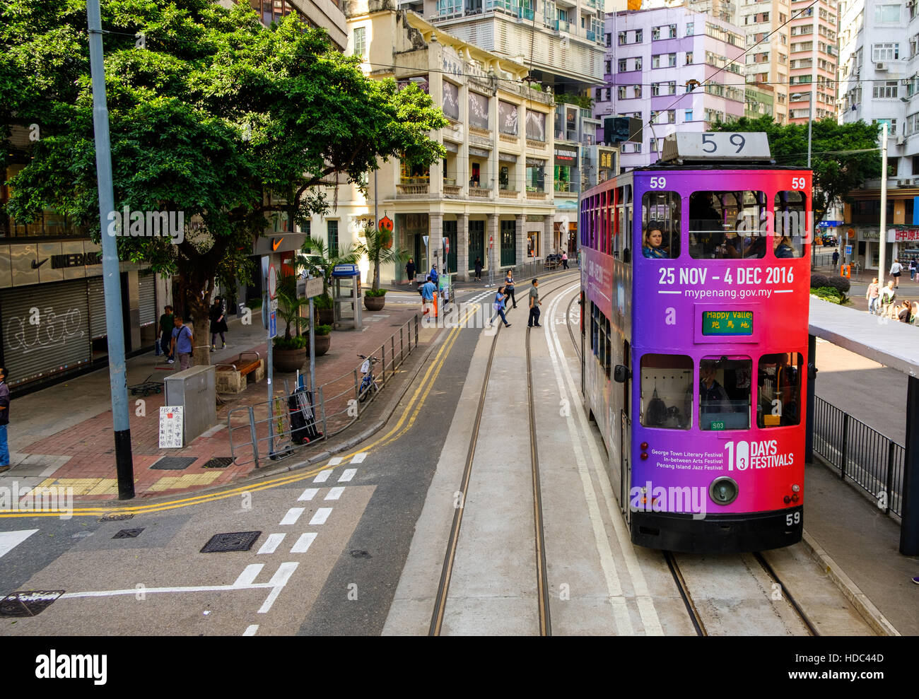 Trams on the street in Hong Kong Stock Photo