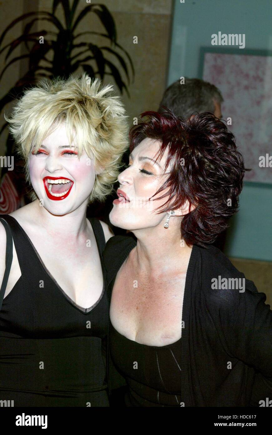 Kelly Osbourne and her mother, Sharon Osbourne arrive at the ACLU Torch