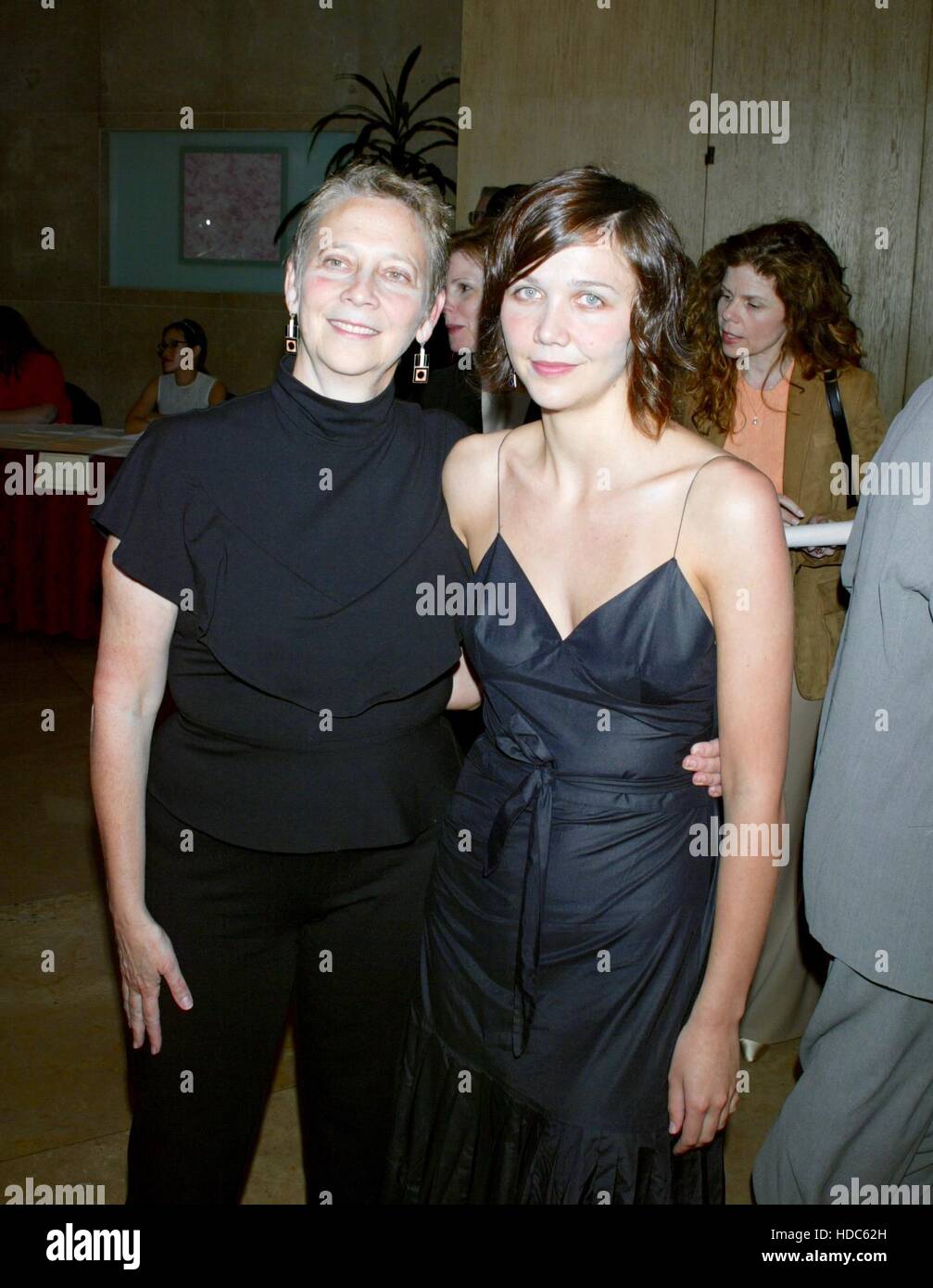 Maggie Gyllenhaal, her mother, Naomi Foner Gyllenhaal arrive at the ACLU Torch of Liberty Awards on May 19, 2003 in Beverly Hills, California. Photo by Francis Specker Stock Photo