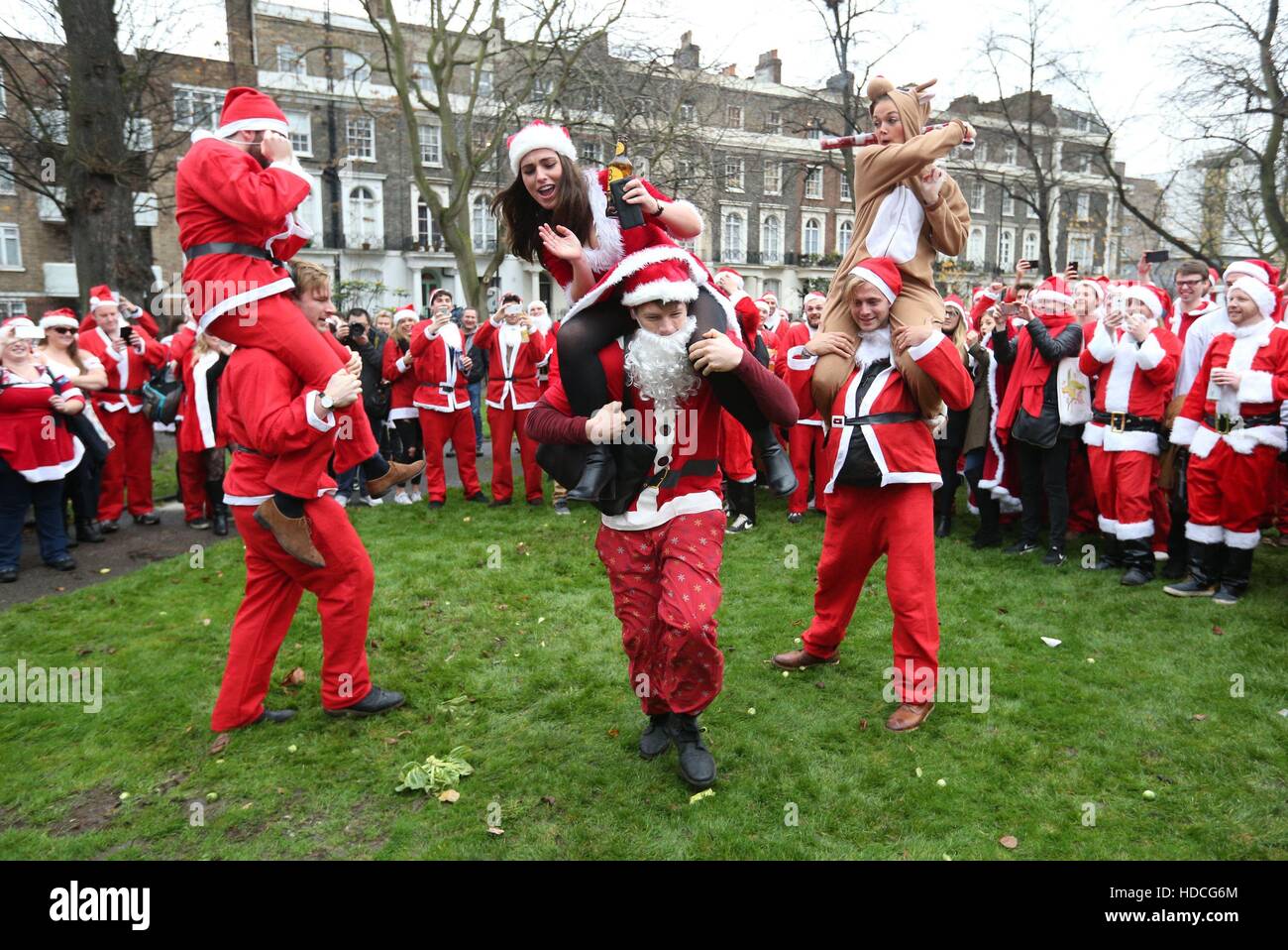 Revellers take part in Santa jousting in Harrington Square Gardens in