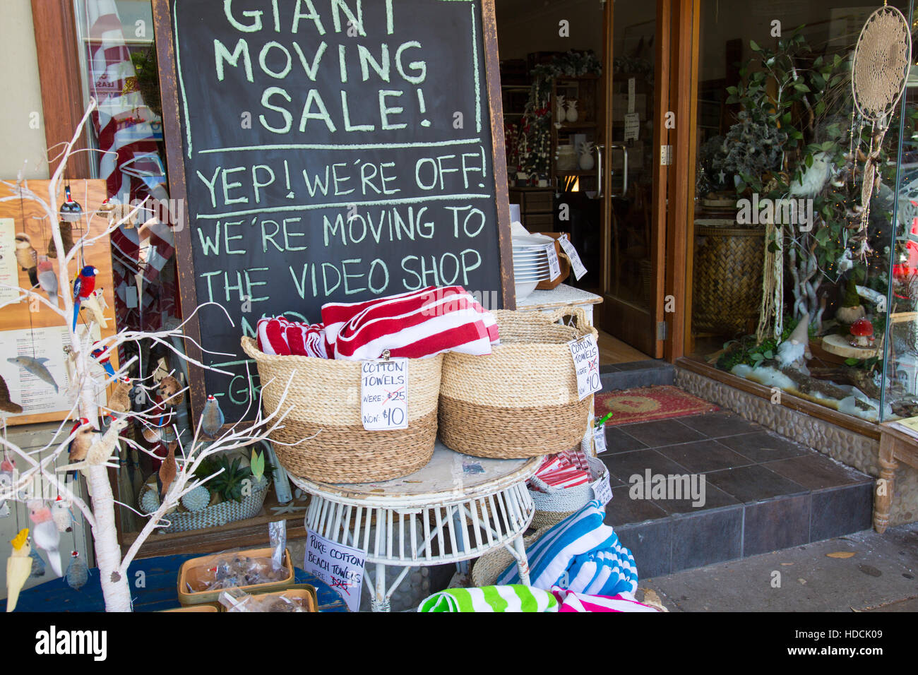 Australian furniture store with sign for their giant moving sale