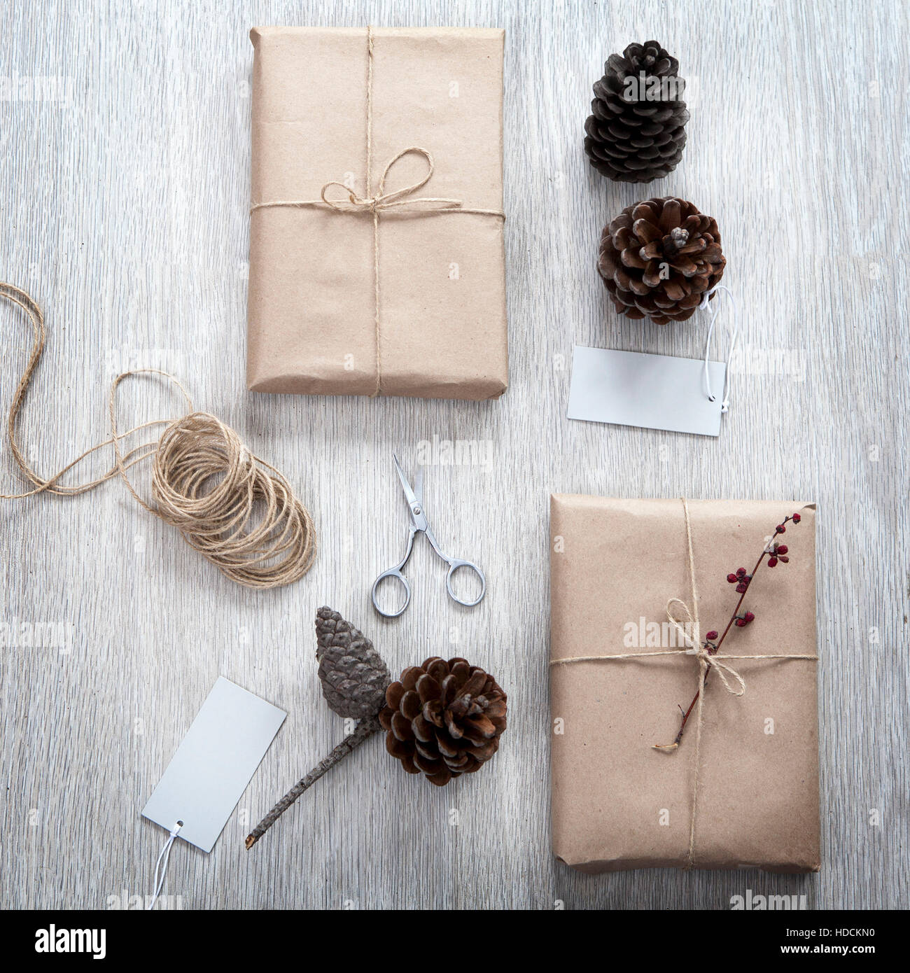Various items for gift wrapping are on the table. Gifts already packed ...