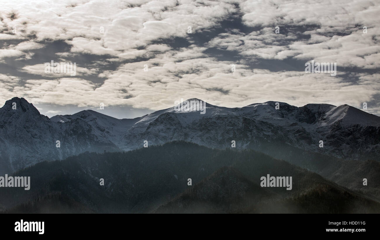 Clouds over the Polish Tatra mountains Stock Photo - Alamy