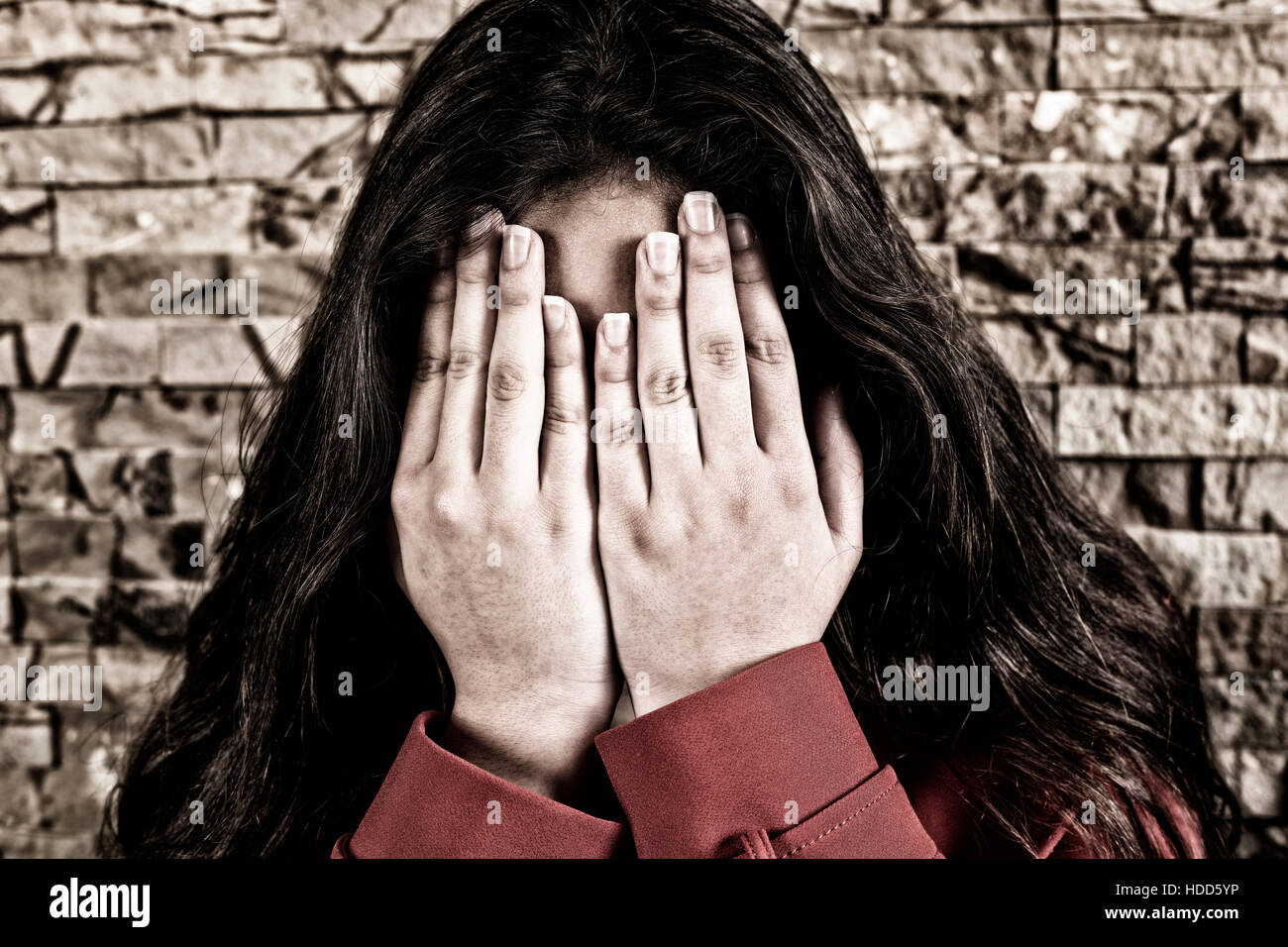 Scared teenage girl hiding face with hands crying Stock Photo - Alamy