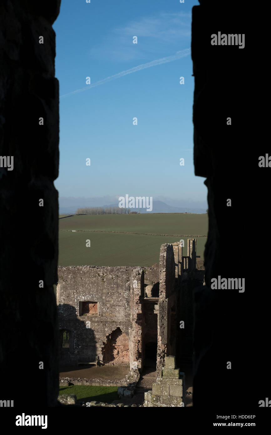 The Black Mountains viewed from arrow slit in castle tower, Wye Valley. Stock Photo