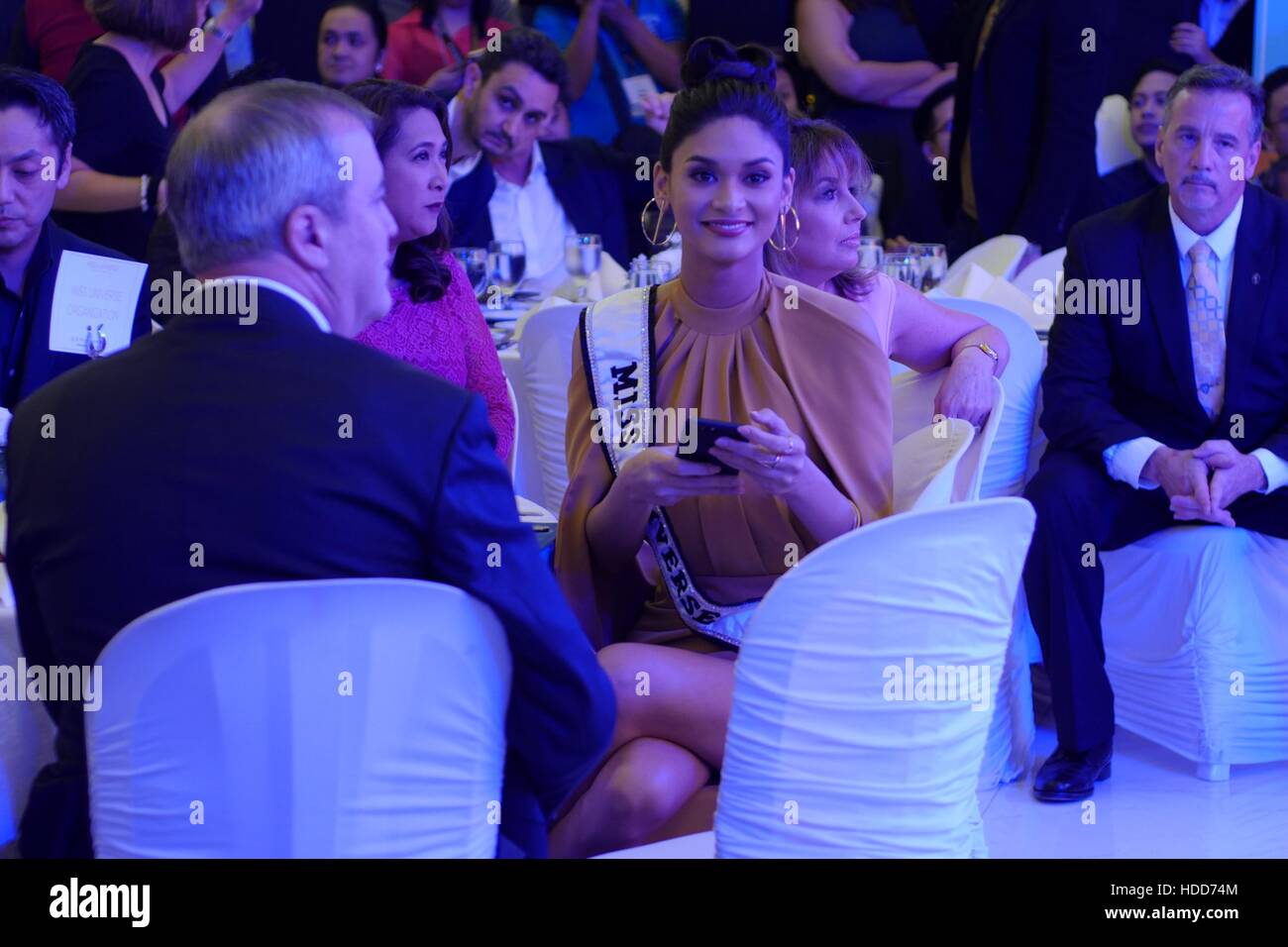 Pasay, Philippines. 10th Dec, 2016. Pia Wurtzbach, takes a look at the cheering fans watching outside the area. Miss Universe officially started in the Philippines with its Kick-off Party at S Maison Mall, Conrad Hotel, SM Mall of Asia, Pasay City at 7:00pm. Presented with Pia Wurtzbach, reigning Miss Universe, candidates from Australia, Japan, Indonesia, Korea, Malaysia, Myanmar, New Zealand, Philippines, Thailand, Vietnam and USA. Credit:  George Buid/Pacific Press/Alamy Live News Stock Photo