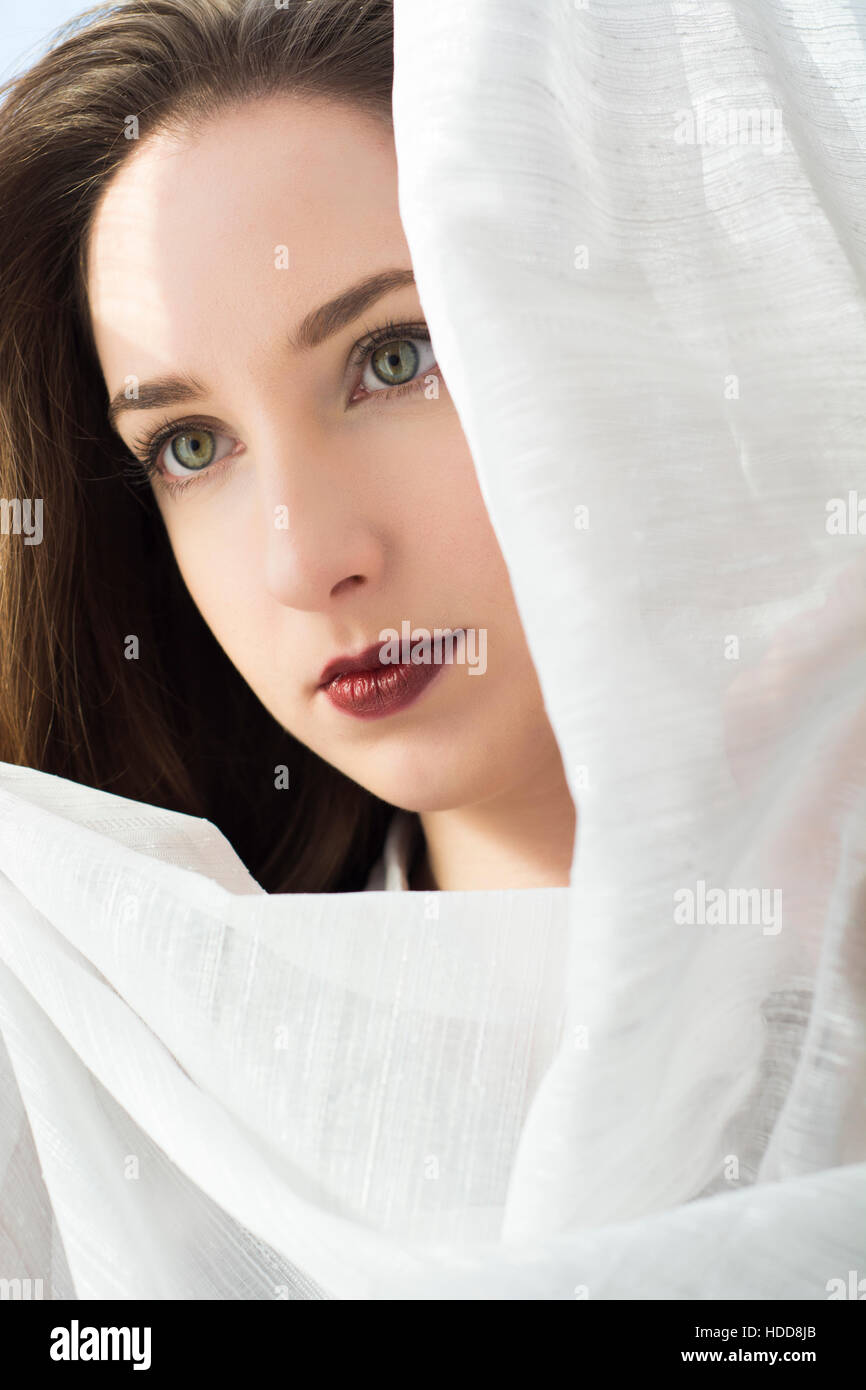 Beautiful young woman looking away Stock Photo