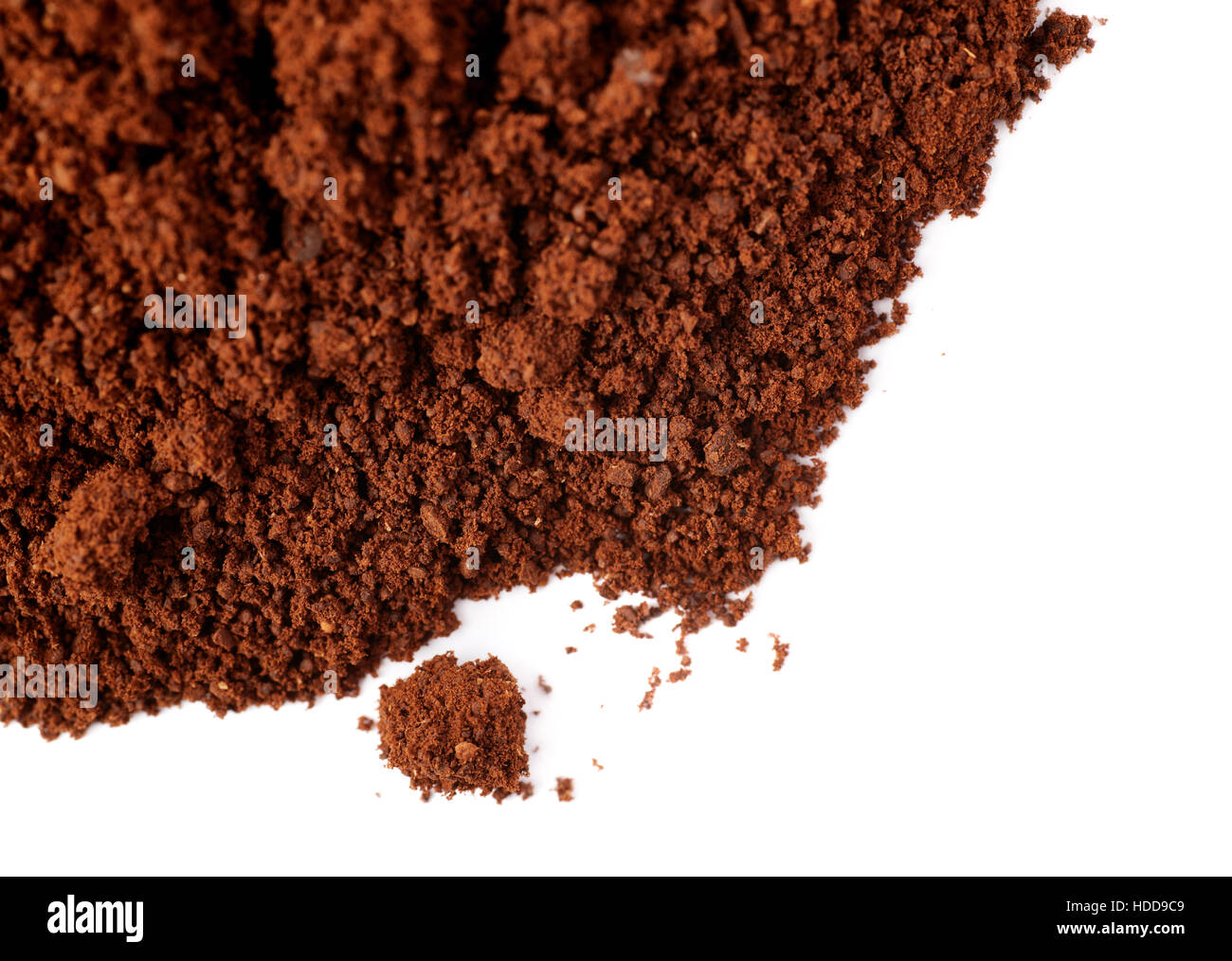 Ground milled black coffee powder isolated over white background Stock
