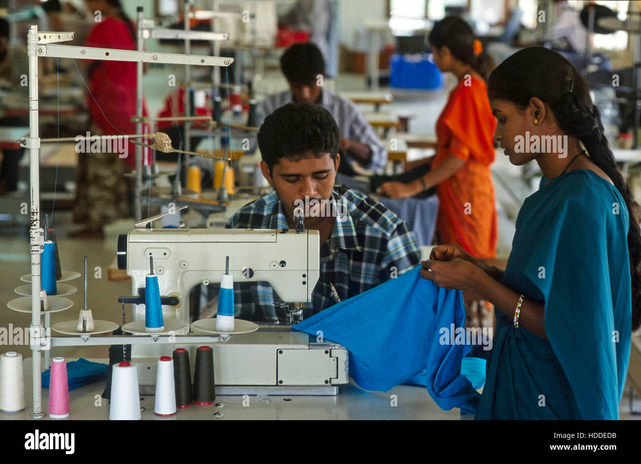 INDIA, Tamil Nadu, Tirupur, textile factory, worker sew garments for