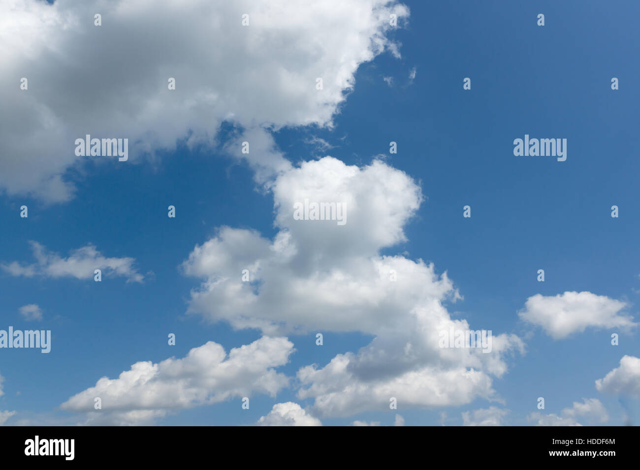 white clouds floating on a background of blue sky Stock Photo - Alamy