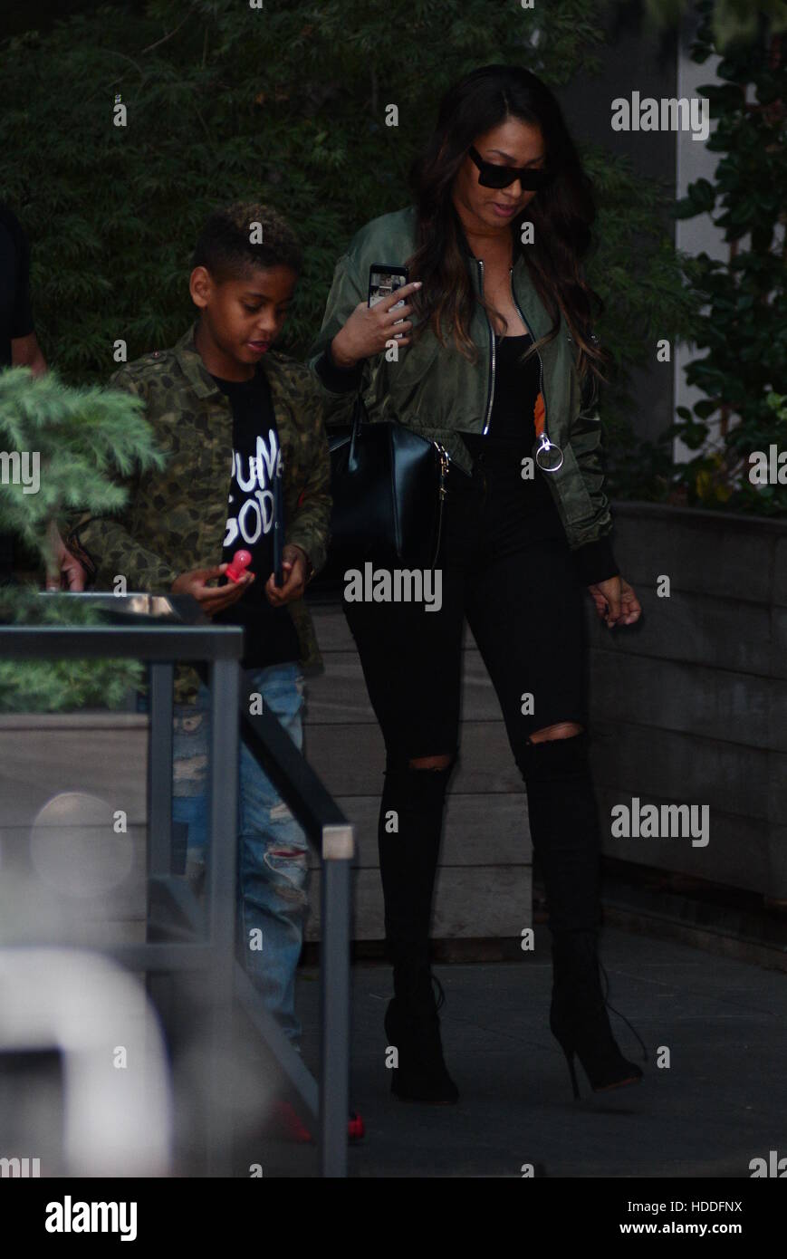 Friends visit Kim Kardashian's apartment in New York City.  Featuring: Lala Anthony, Kiyan Carmelo Anthony Where: Manhattan, New York, United States When: 04 Oct 2016 Stock Photo