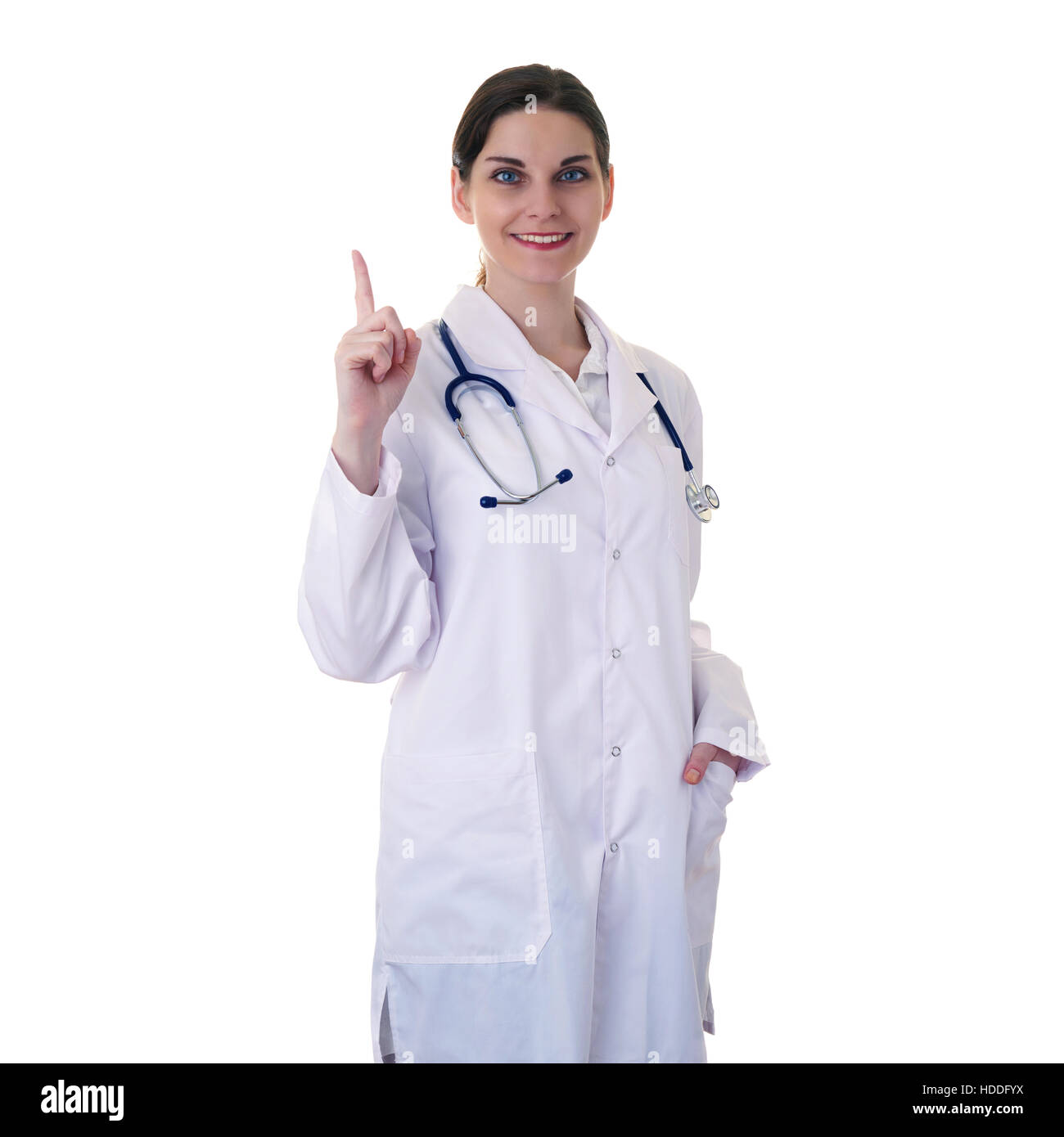 Smiling female doctor assistant in white coat over white isolated background with stethoscope and pointing up, healthcare, profession and medicine con Stock Photo