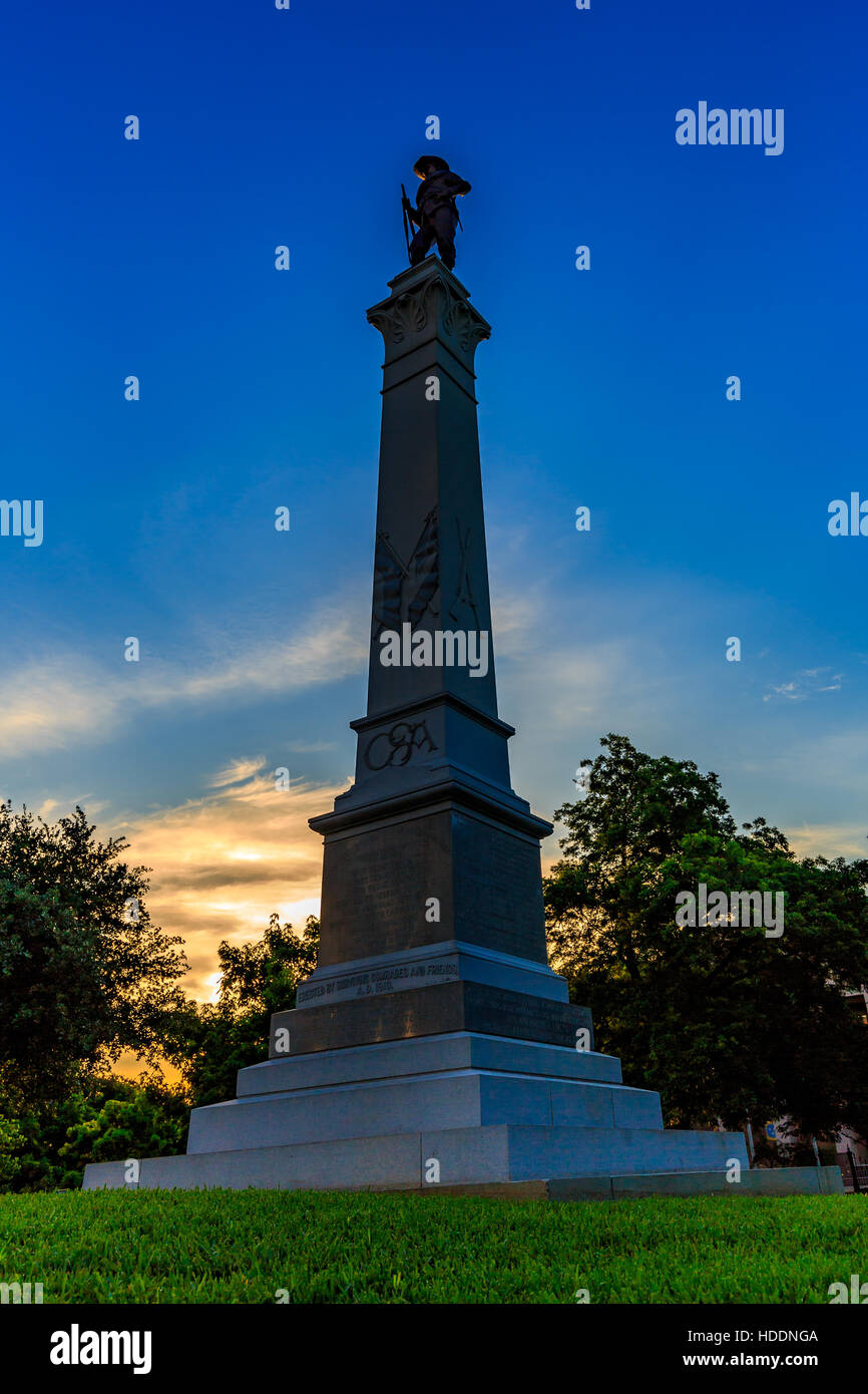 Austin, Texas, USA - JUNE 5, 2016: Hood's Texas Brigade statue viewed in the early morning, a bronze figure of a Confederate soldier tops a gray grani Stock Photo