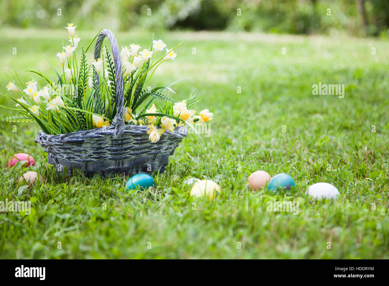 Wicker basket with flowers Stock Photo Alamy