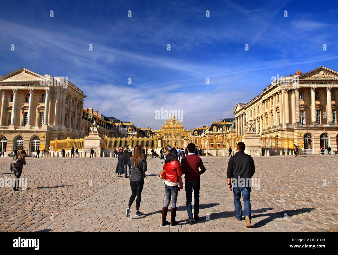 Tourists outside the Palace of Versailles, France. Stock Photo