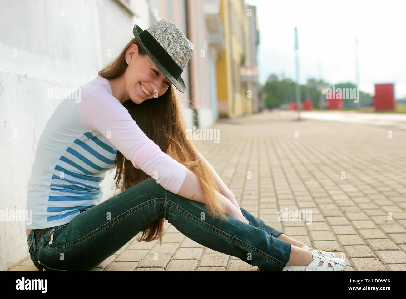 Pretty cute girl with long blond hair on a walk Stock Photo - Alamy