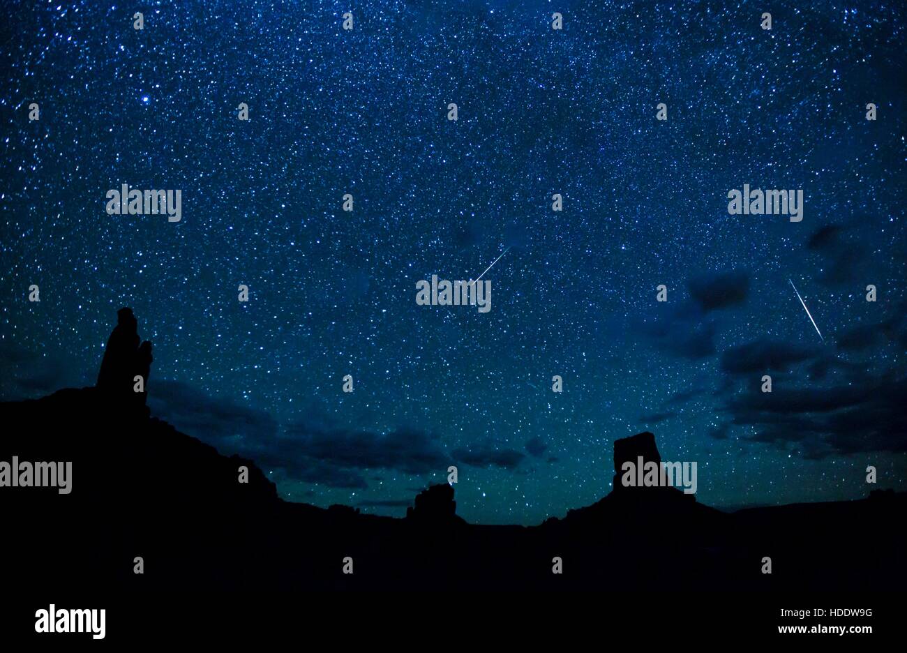 A Perseid meteor shower in the starry night sky in the Valley of the