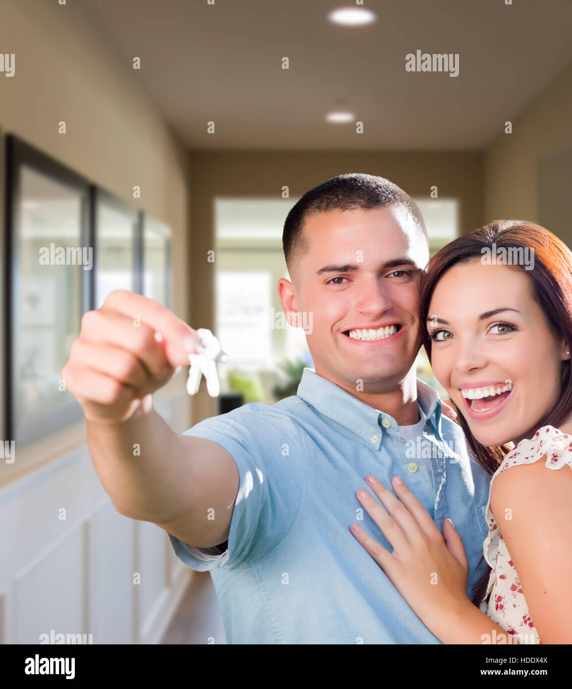 Happy Military Couple with House Keys Inside Hallway of New Home Stock ...