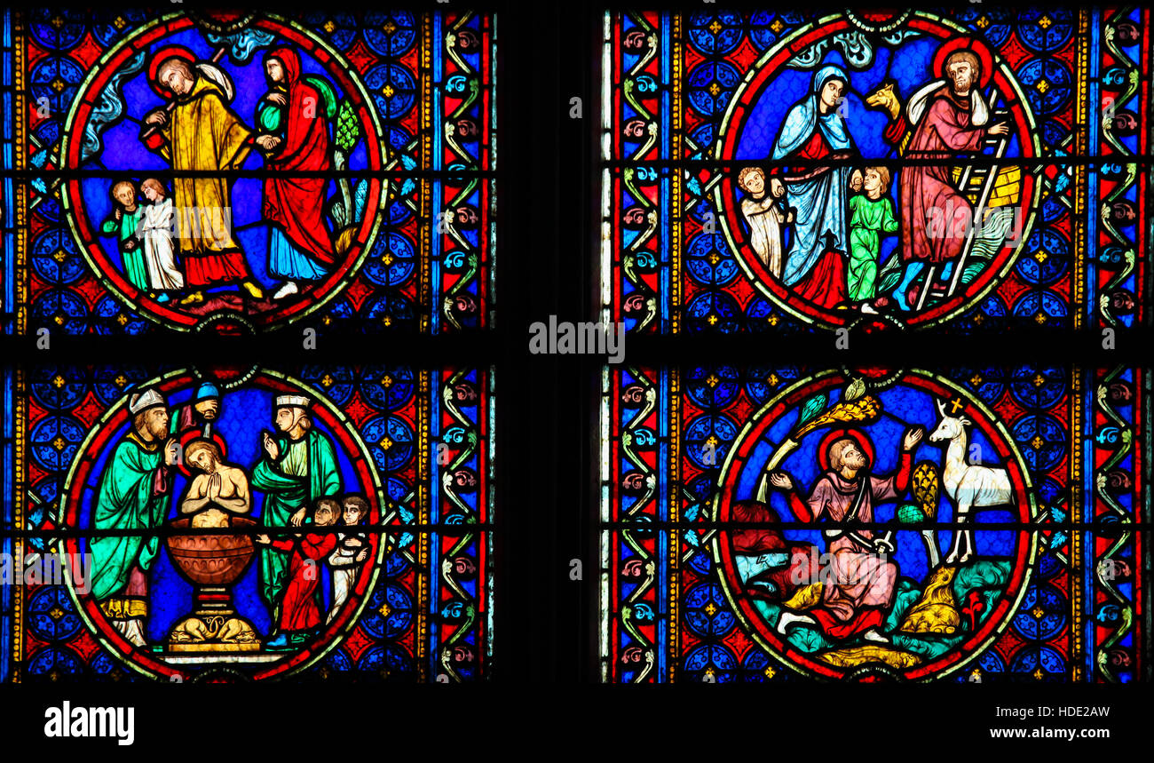 Stained Glass in Notre Dame Cathedral of Paris depicting scenes in the Life of Saint Joseph, husband of Mary, Mother of Jesus Stock Photo