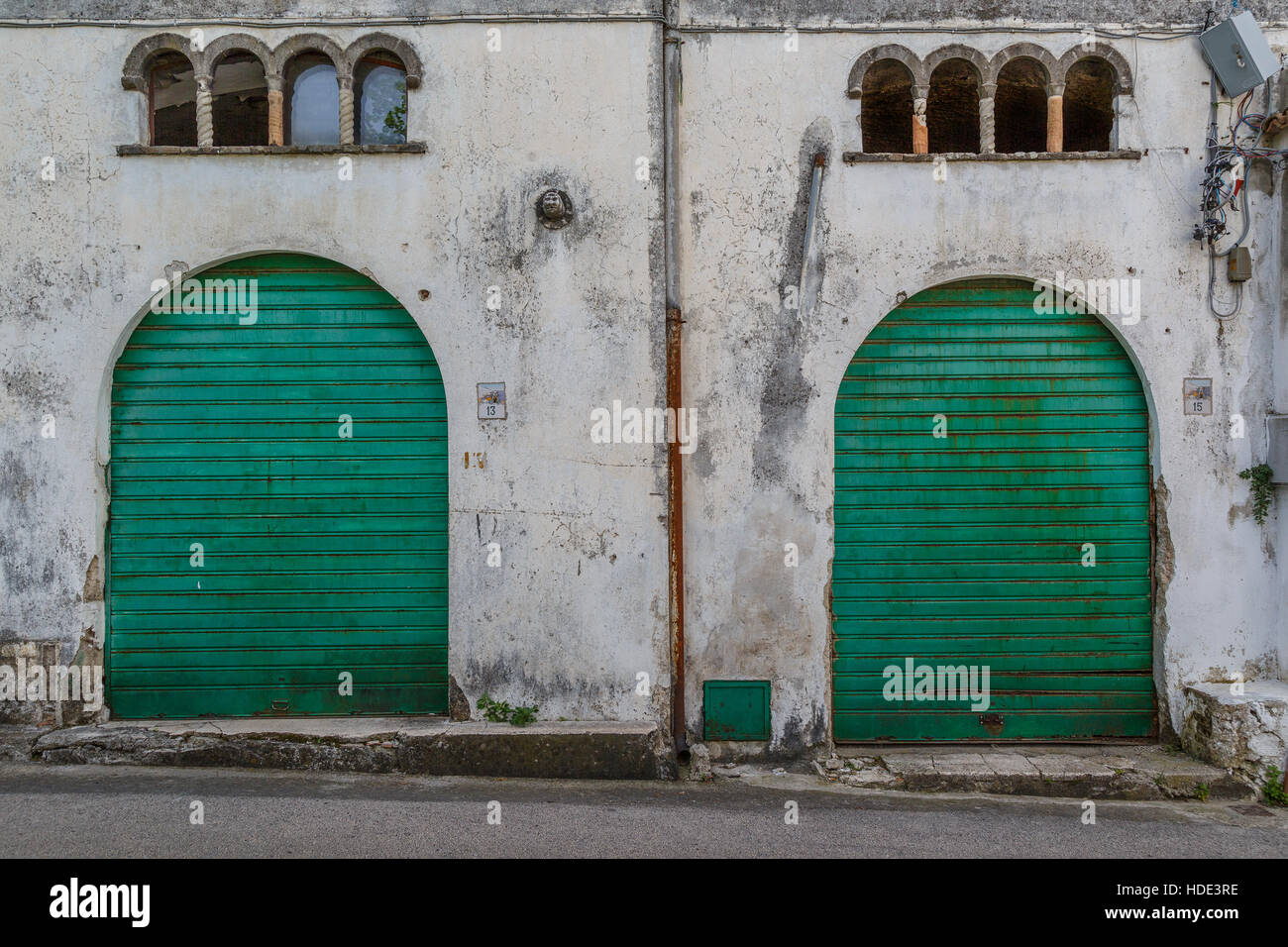 Twin green shuttered doorways in the historic town of Ravello, Italy. Stock Photo