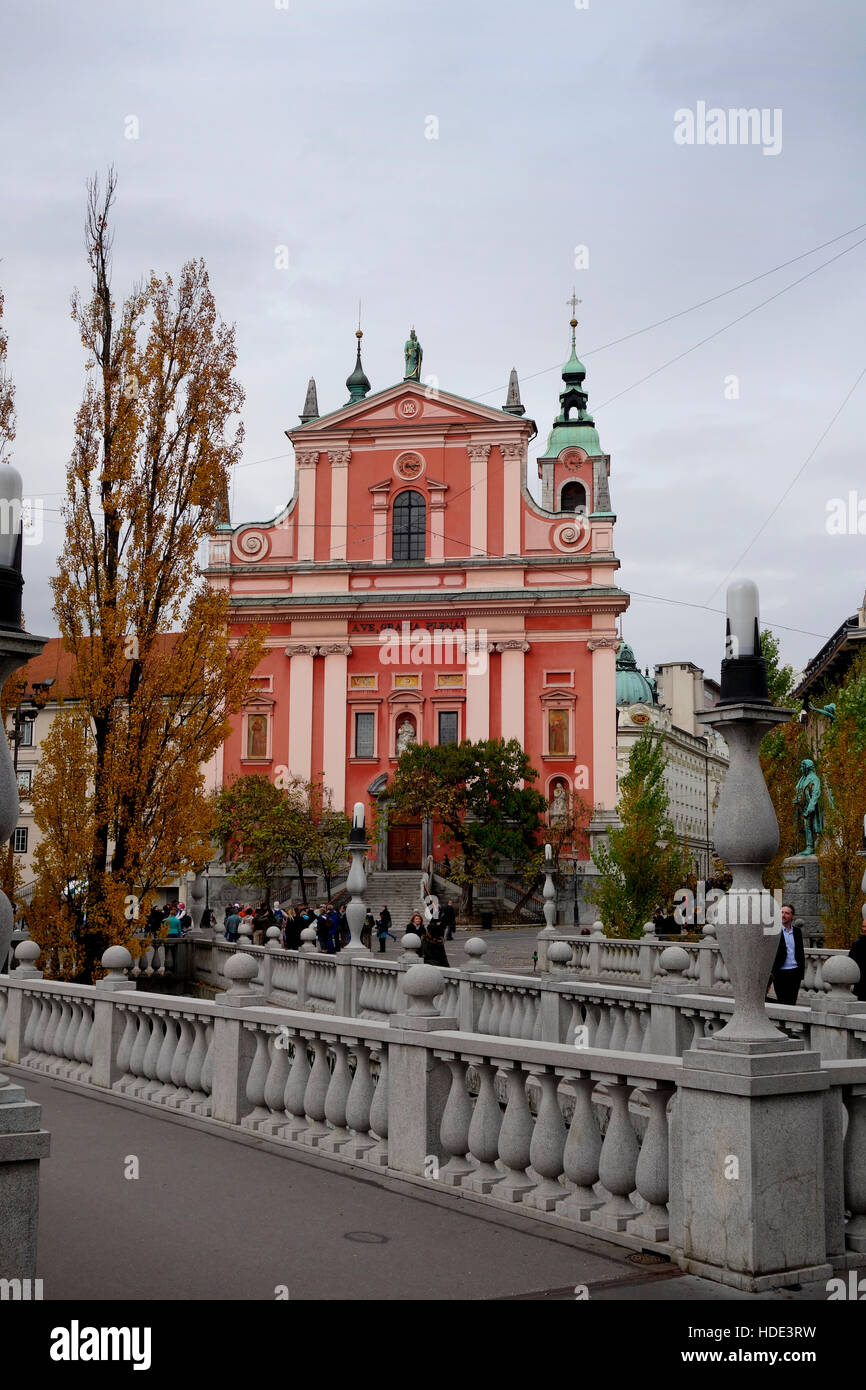 Franciscan Church of the Annunciation viewed over tromostovje bridge. Ljubljana, Slovenia Stock Photo