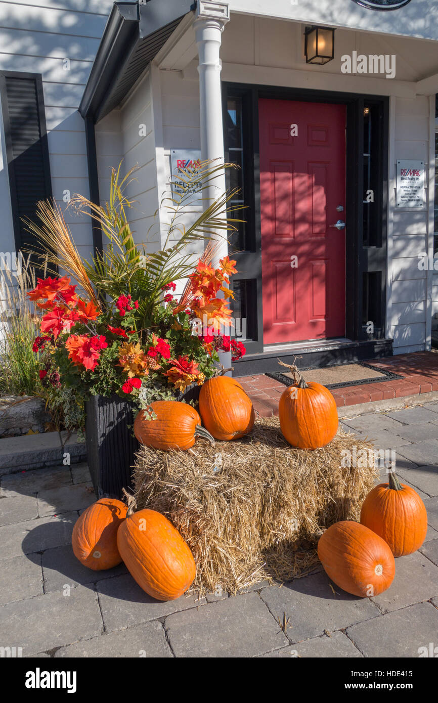 pumpkin haystack decoration front entrance fall autumn Stock Photo