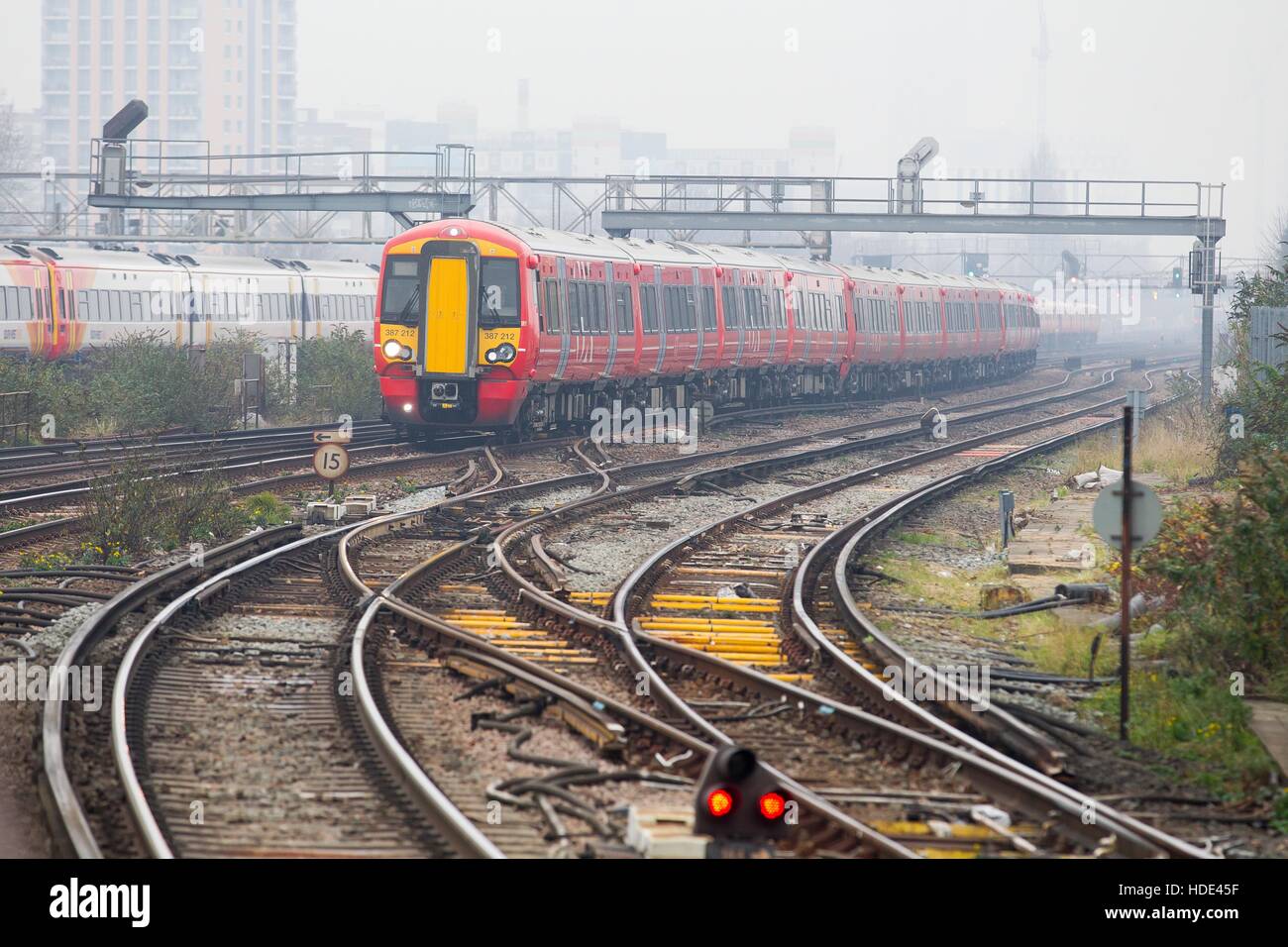 A class 387 Gatwick express train passes through Clapham Junction station in South West London 387212 Stock Photo