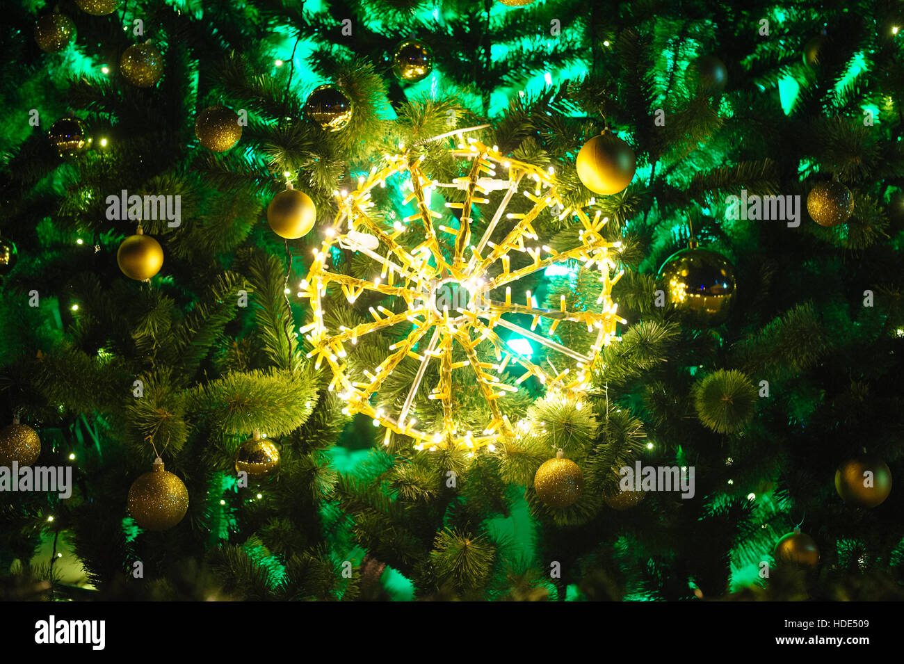 illuminated Christmas tree decoration with balloons Stock Photo